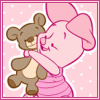 Piglet hugs teddy bear